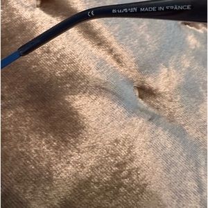 Sharp blue sunglasses in excellent condition come with original box and cloth